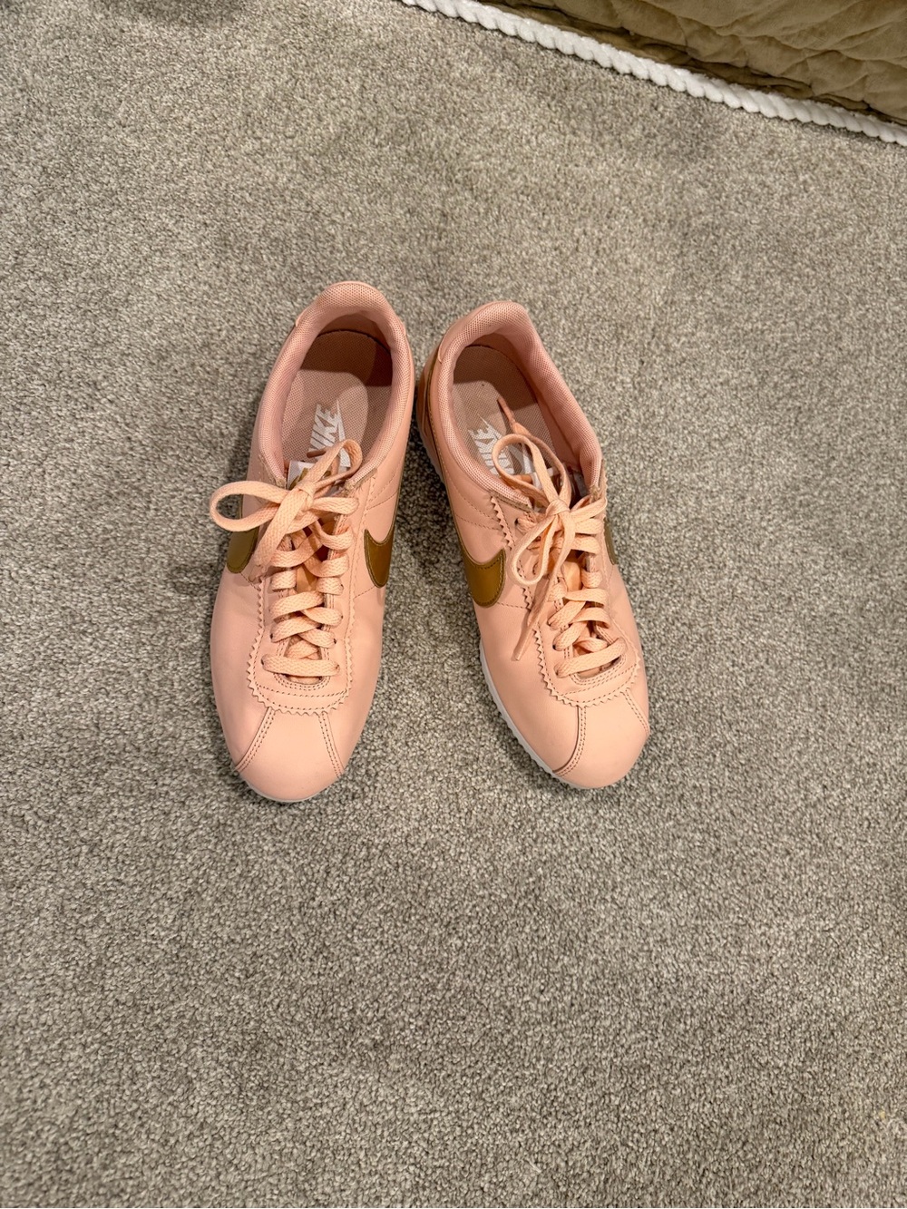 Nike Women's Peach Sneakers with Gold Swoosh Accent Size 8.5